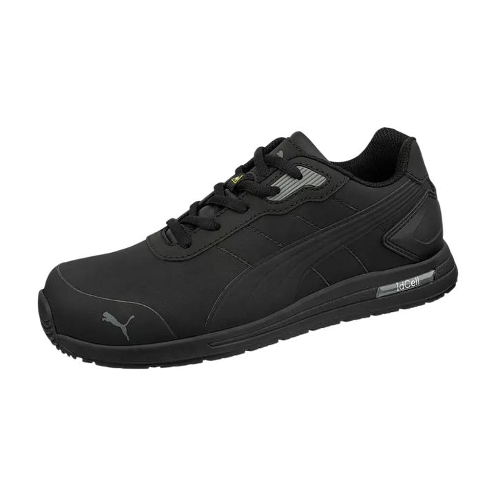 Scarpa di sicurezza Puma nera con un design elegante e moderno che presenta accenti grigi sottili e il marchio della tecnologia ’idcell’ sulla suola intermedia.