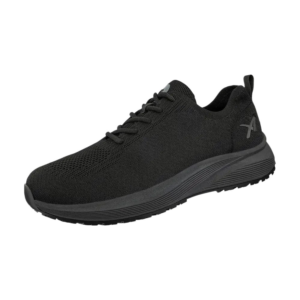 Sneaker in maglia nera con tomaia testurizzata e suola in gomma grigio scuro.